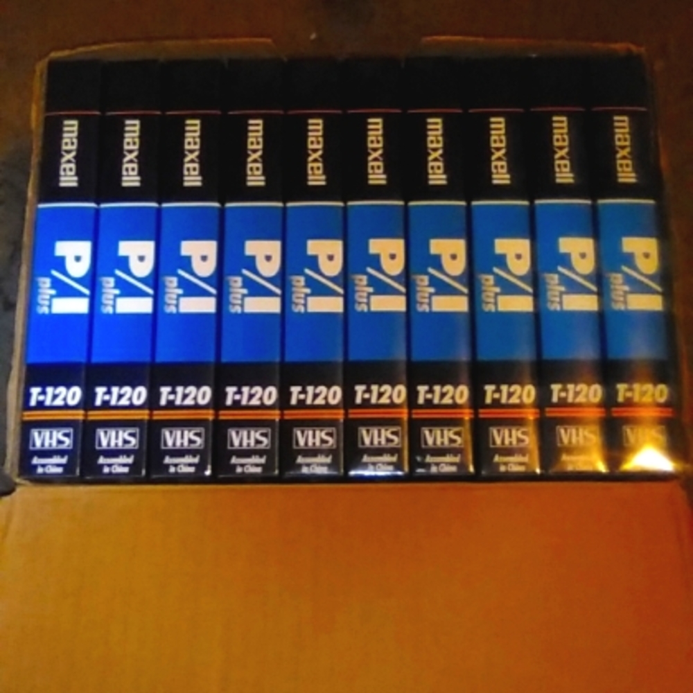 10pk box of Maxell T-120 Plus blank VHS tapes.